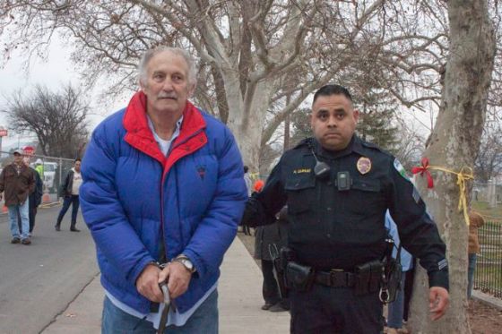 Elderly gentleman with cane gets cited.