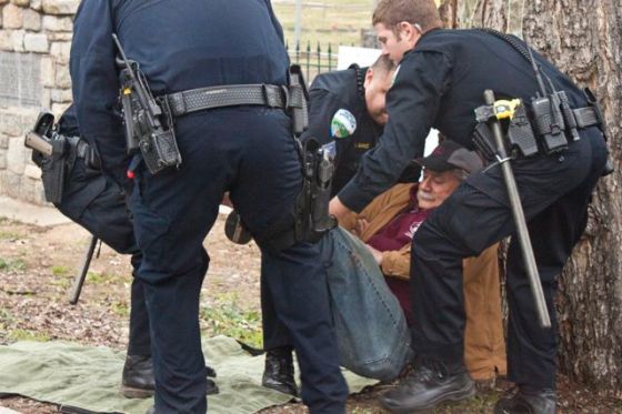 Bill goes limp and is carried out of fenced area.